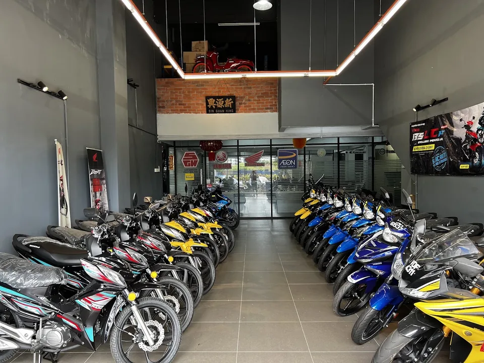 Motorcycles on display inside the SGH showroom.
